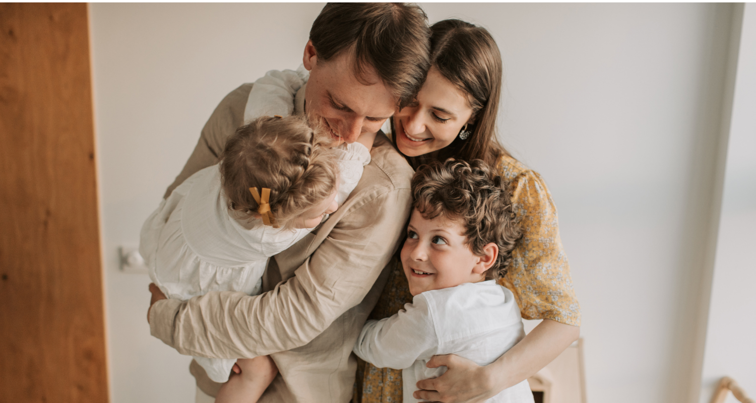A warm family embrace in a light-filled home